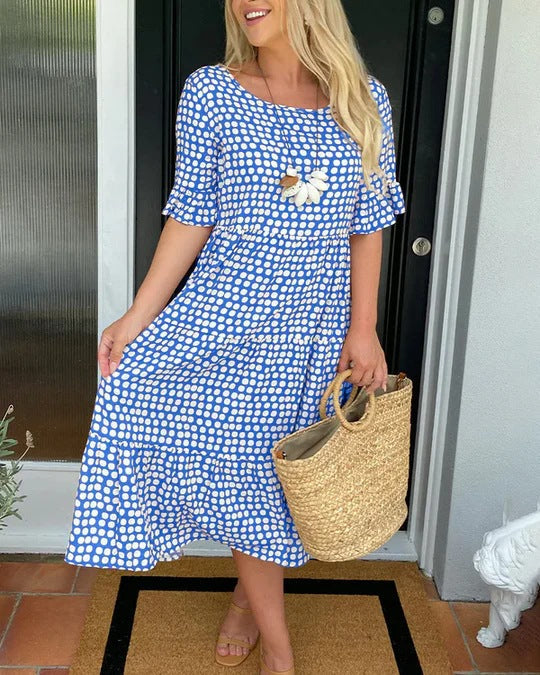 Versatile women's dotted midi dress in a relaxed, flowy fit; perfect for summer, casual, or vacation outfits.
