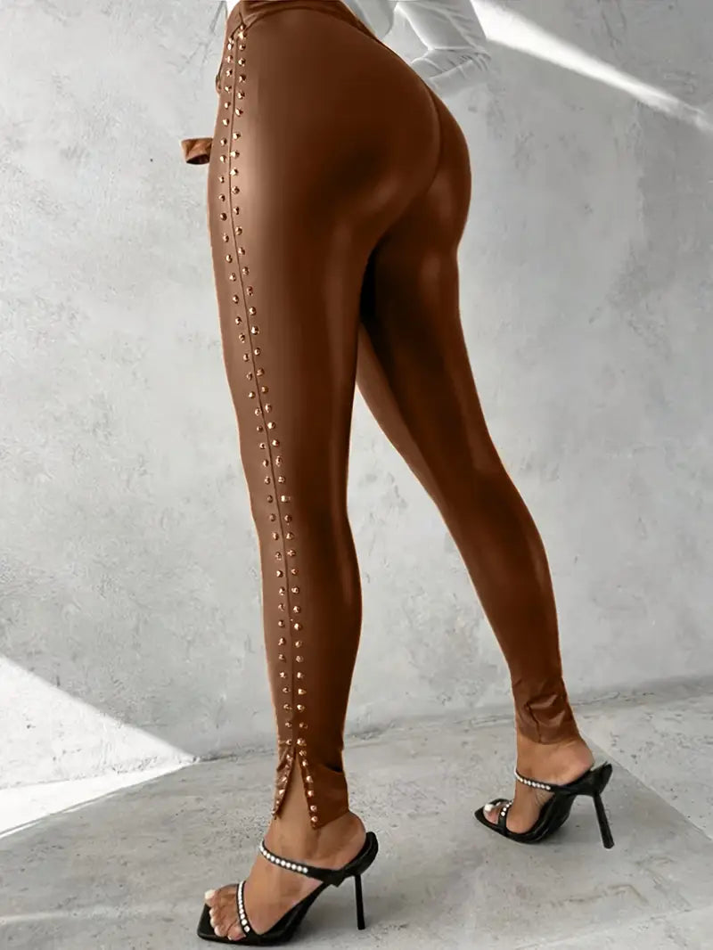 Chic brown faux leather studded pants for women, skinny fit, high waist, perfect for edgy style.