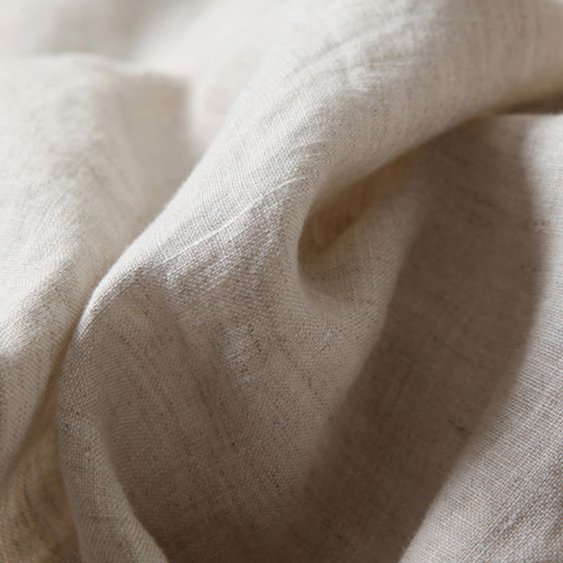 Comfortable women's flowy wide-leg trousers in a neutral tone, high-waisted for a relaxed fit.