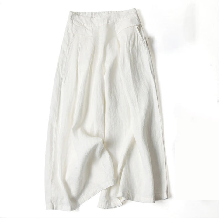 Relaxed fit women's flowy wide-leg trousers, high-waisted, an essential for comfortable casual wear.