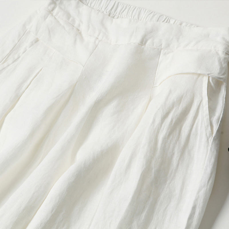 Printed flowy wide-leg trousers for women, high-waisted, combining relaxed comfort with bold style.