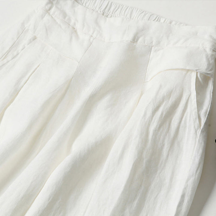 Printed flowy wide-leg trousers for women, high-waisted, combining relaxed comfort with bold style.