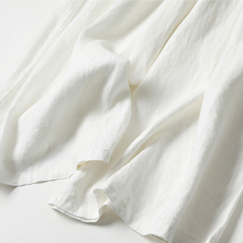 Elegant women's flowy wide-leg trousers, high-waisted, providing a relaxed fit for polished everyday looks.