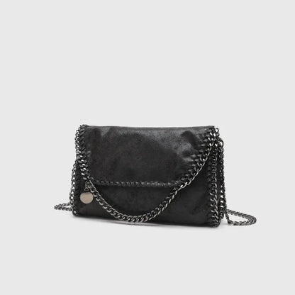Grey gothic shoulder bag for women, featuring a chic chain strap and vintage finish, a unique fashion accessory.