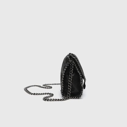 Stylish women's gothic shoulder bag with a bold chain strap, perfect for adding a dark touch to any outfit.
