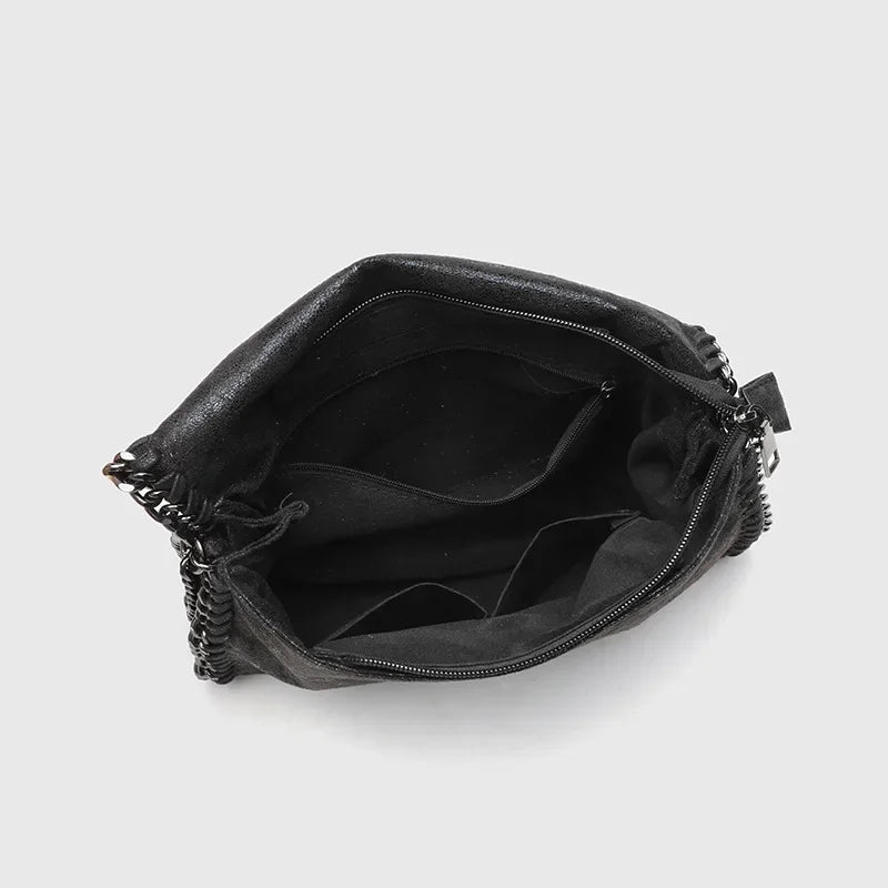 Vintage finish black gothic shoulder bag for women, with an elegant chain strap, a versatile fashion accessory.