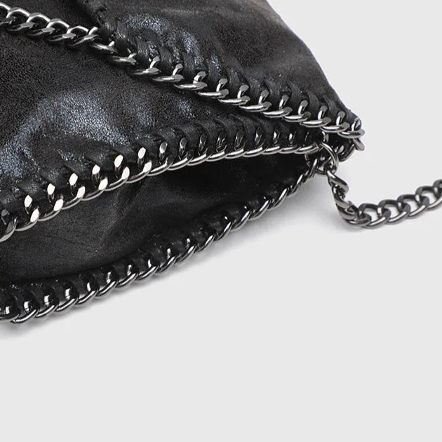 Women's gothic style shoulder bag, a fashionable black bag with a distinctive chain strap and vintage feel.