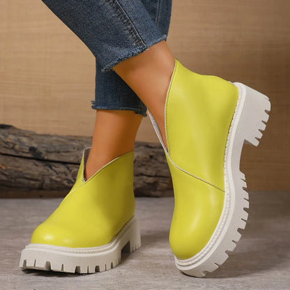 Modern women's leather slip-on platforms, combining subtle lift with everyday comfort.