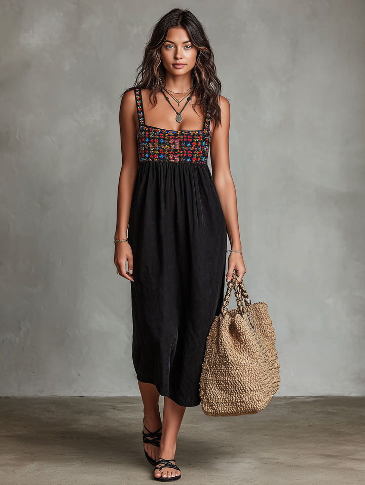 Chic women's black sleeveless midi dress, square neck, with beautiful floral embroidery; ideal for parties or holidays.