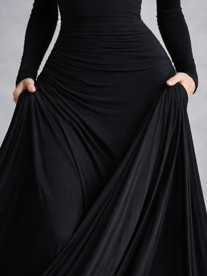 Women's formal black off-shoulder long sleeve maxi dress, a classic choice for evening wear.