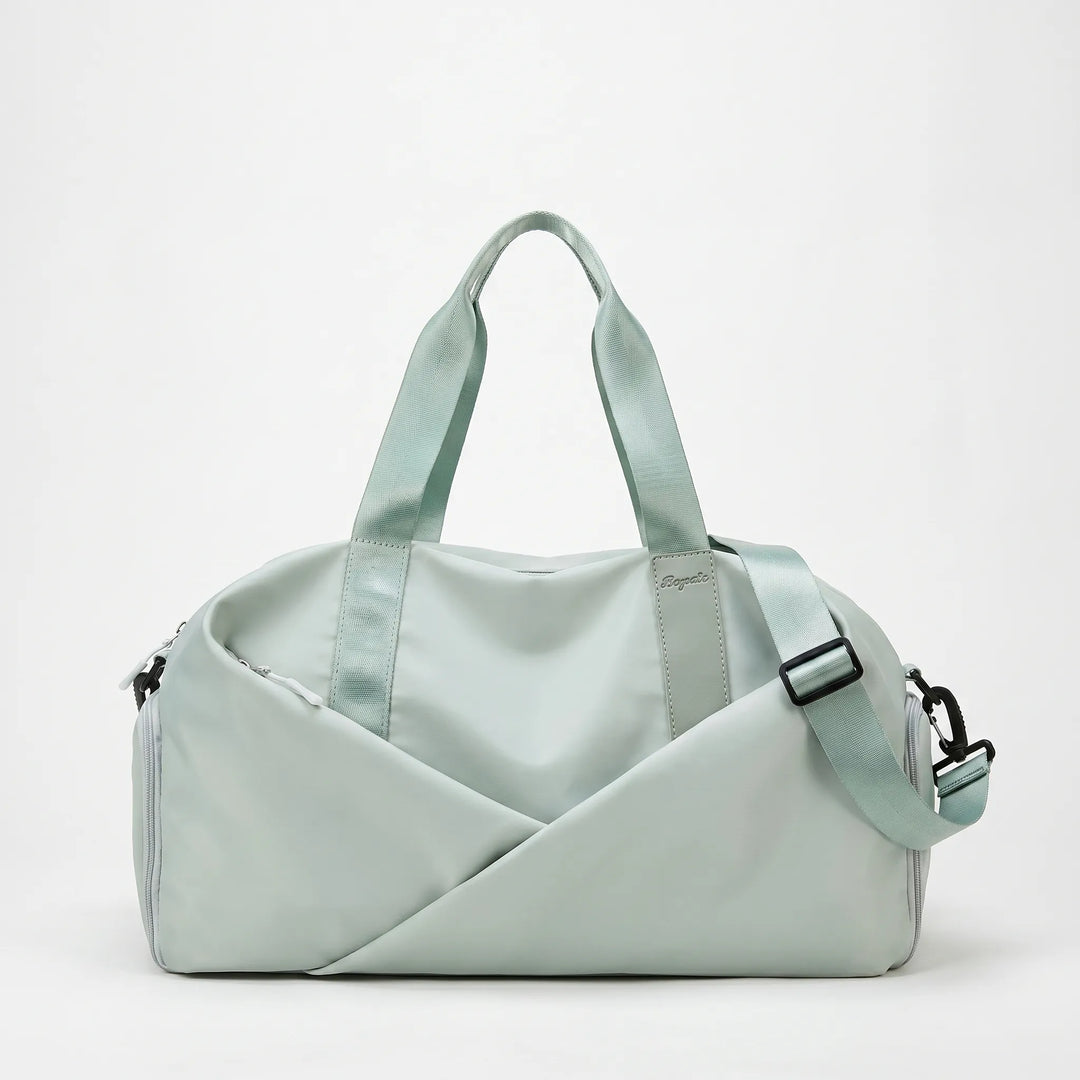 Durable nylon women's duffel bag, perfect for gym, sports, yoga, and short active travel trips.