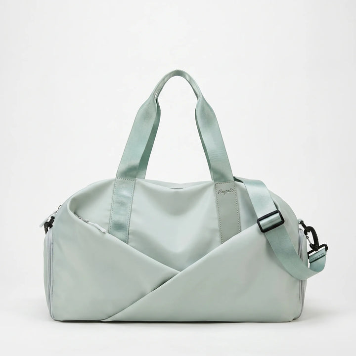 Durable nylon women's duffel bag, perfect for gym, sports, yoga, and short active travel trips.