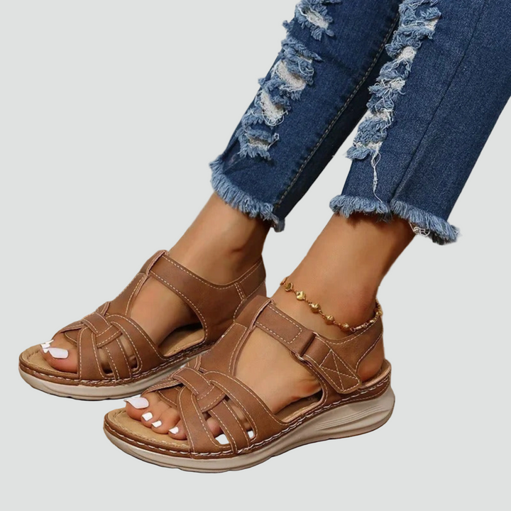 Women's black orthopedic comfort sandals with adjustable straps, ideal for daily wear & walking support.