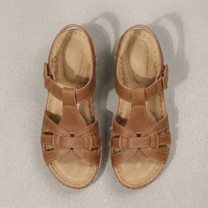 Supportive women's orthopedic walking sandals. Adjustable straps ensure all-day comfort for daily wear. Open toe.