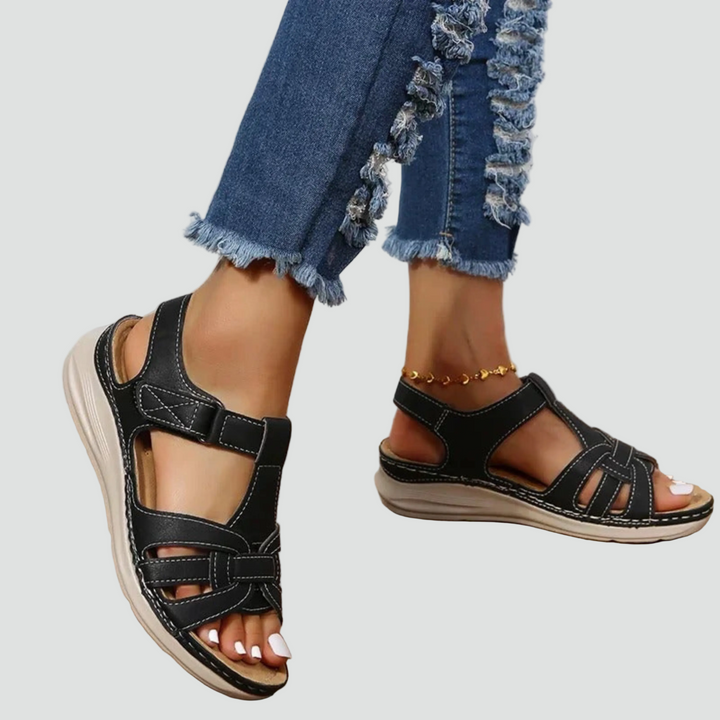 Brown women's orthopedic sandals with adjustable straps, perfect for supportive walking and casual summer days.