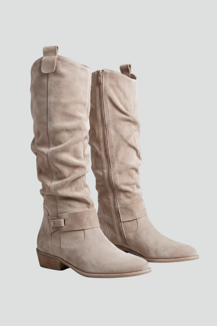 Women's black orthopedic knee-high boots with side zipper, offering comfort & support for fall & winter.