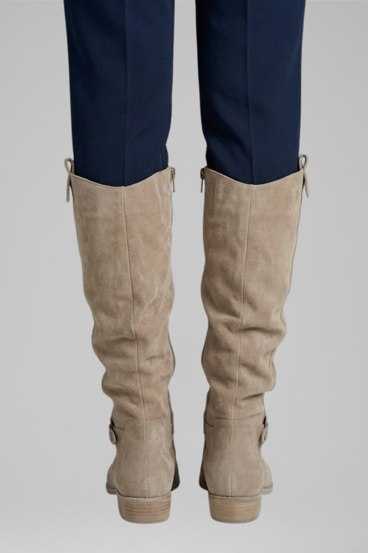Warm winter women's knee-high orthopedic boots. Side zipper for easy access, perfect for cold weather.