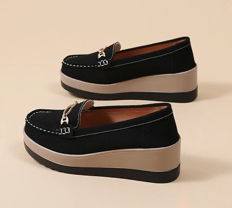 Women's comfortable brown platform loafers, a versatile choice for any everyday or work outfit.