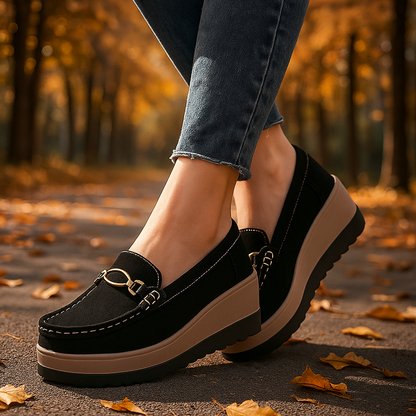 Comfortable women's black platform loafers with orthopedic support for ultimate foot health.