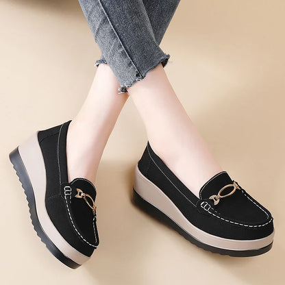 Slip-on brown platform loafers for women, featuring a comfortable orthopedic sole for daily use.