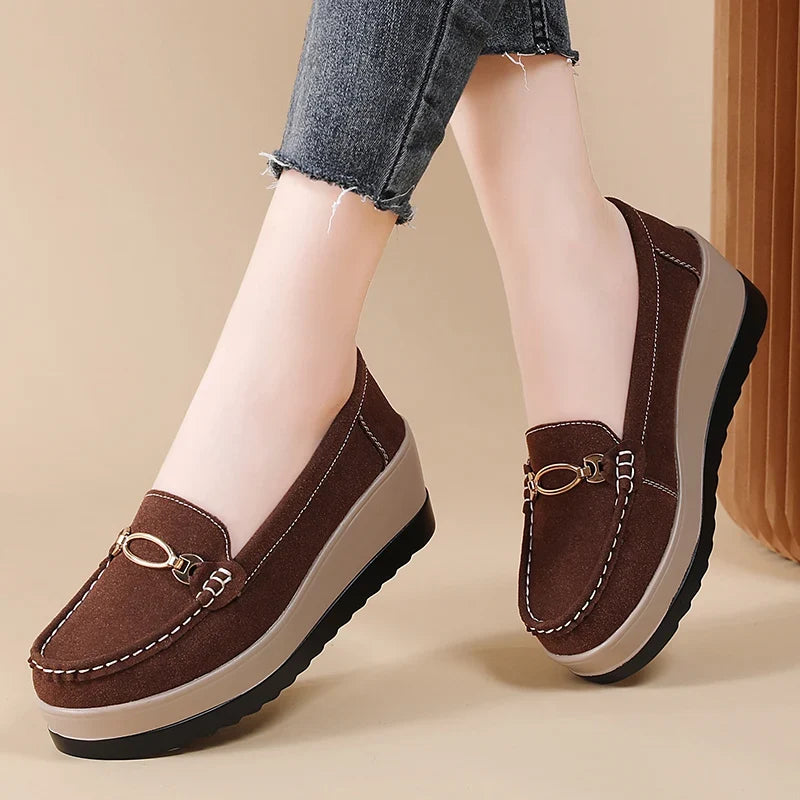 Elegant brown orthopedic platform loafers for women, perfect for professional or relaxed settings.