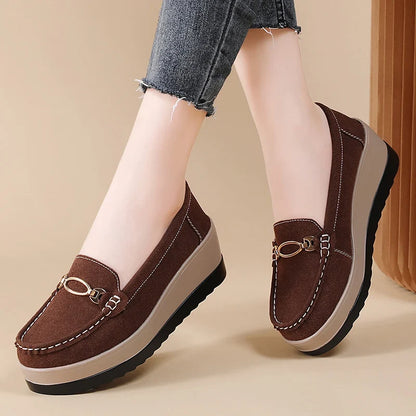 Elegant brown orthopedic platform loafers for women, perfect for professional or relaxed settings.