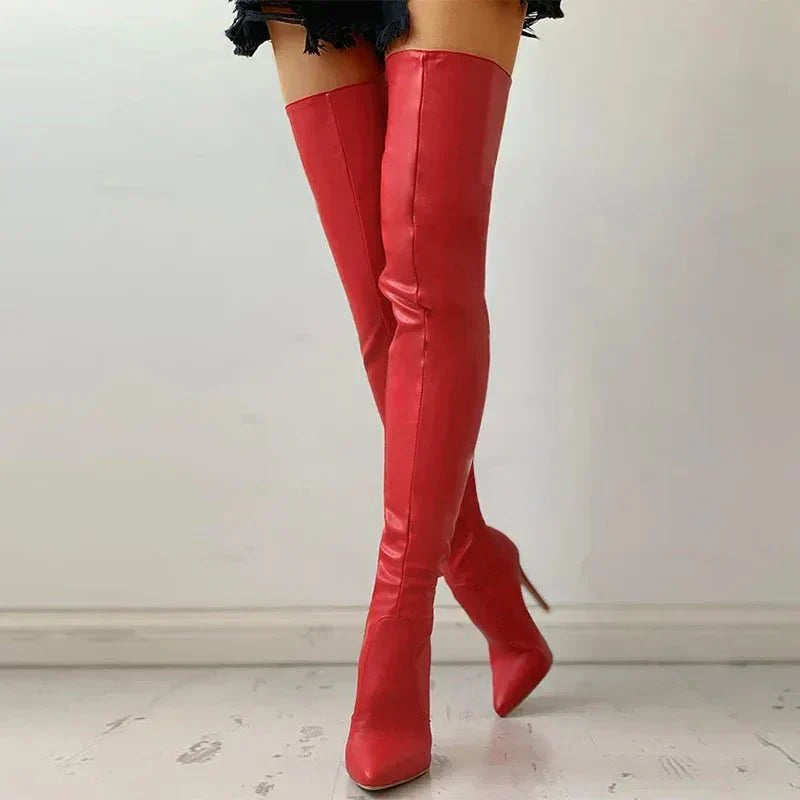 Stylish women's black over-the-knee party boots with stiletto heels and a sharp pointed toe for formal events.