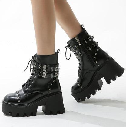 Stylish black women's platform ankle boots, waterproof, with a chunky heel for an edgy fashion statement.