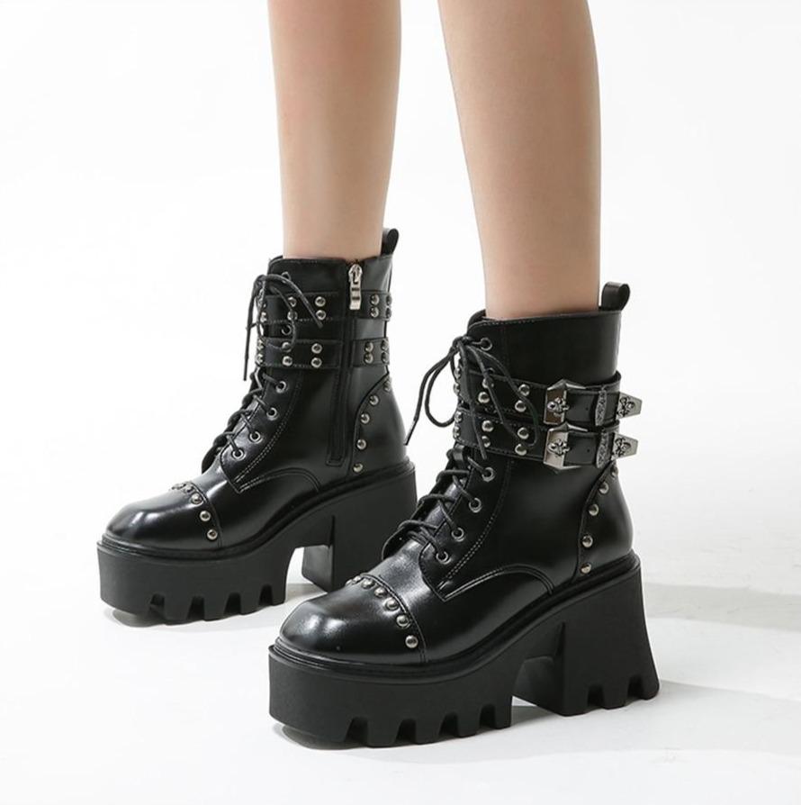 Bold women's platform ankle boots with a tall chunky heel, comfortable and stylish for an edgy look.