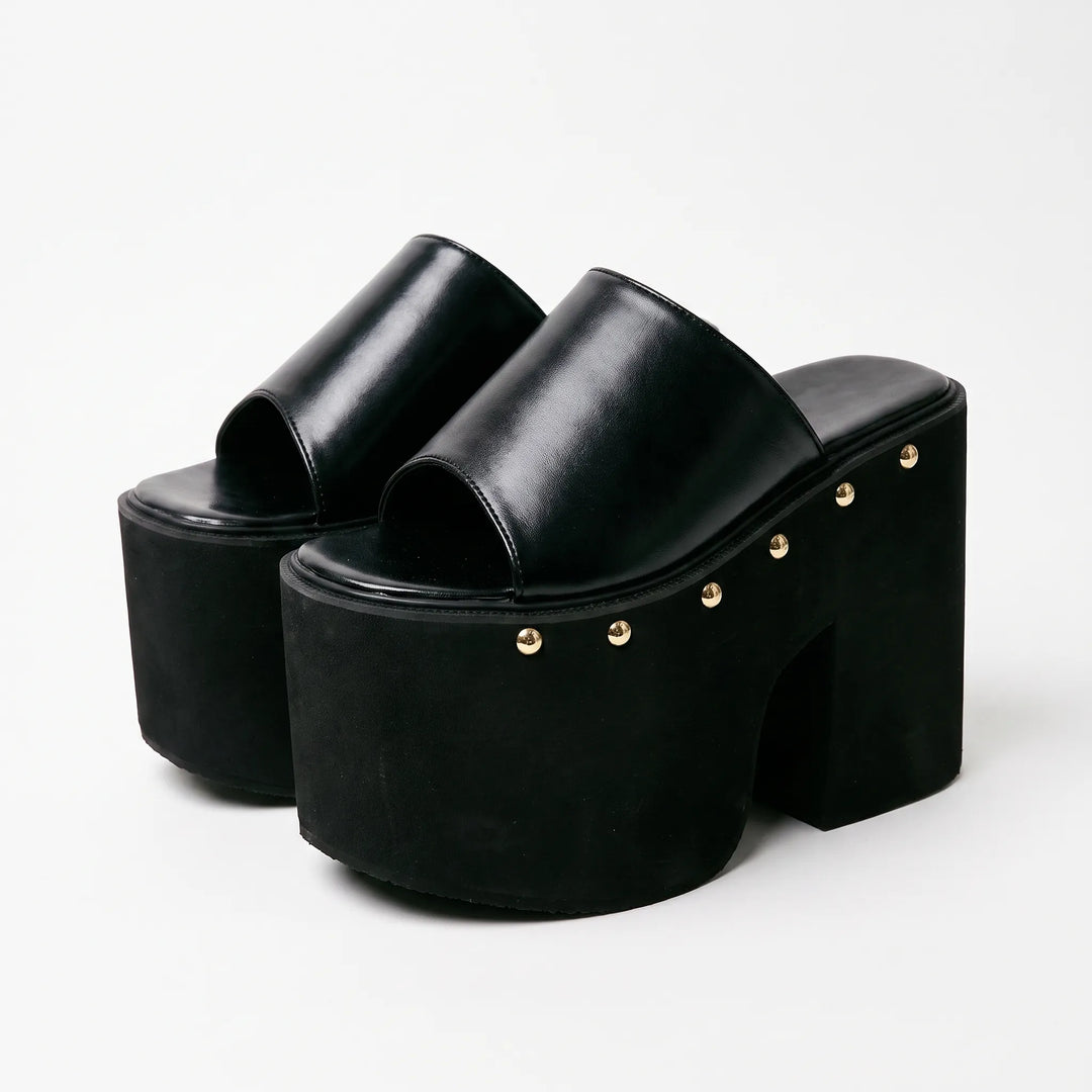 Black platform high-heel sandals for women, featuring a chunky block heel & easy slip-on design.