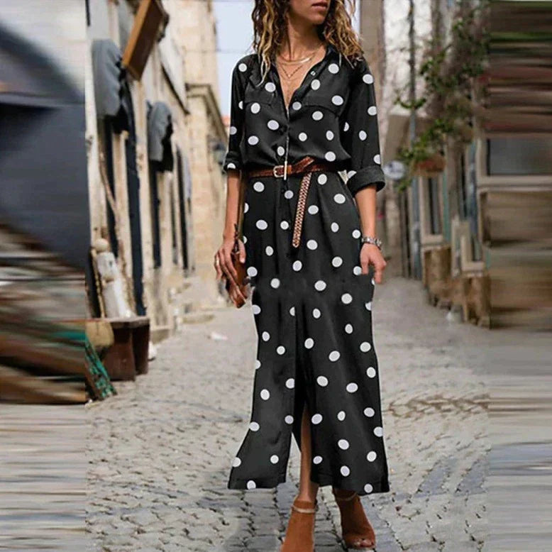 Flowy women's polka dot maxi dress featuring long sleeves, full button-down, and tie waist. Perfect casual everyday style.