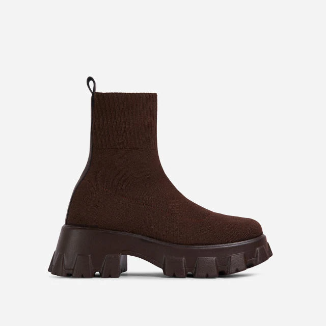 Stylish women's slip-on ankle boots, perfect for a modern casual and chic look.