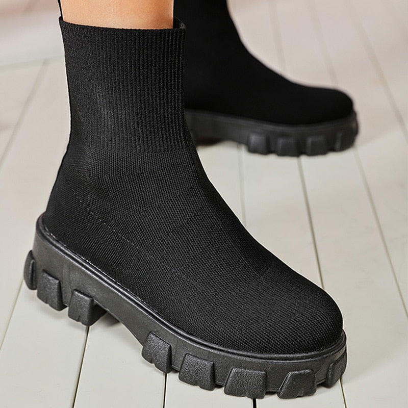 Modern women's slip-on ankle boots, a sleek choice for stylish everyday footwear.