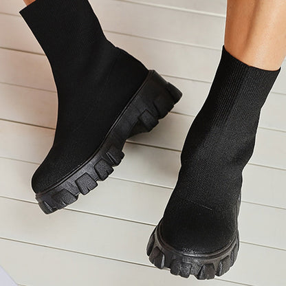 Chic women's slip-on ankle boots, designed for comfort and trendy casual styling.