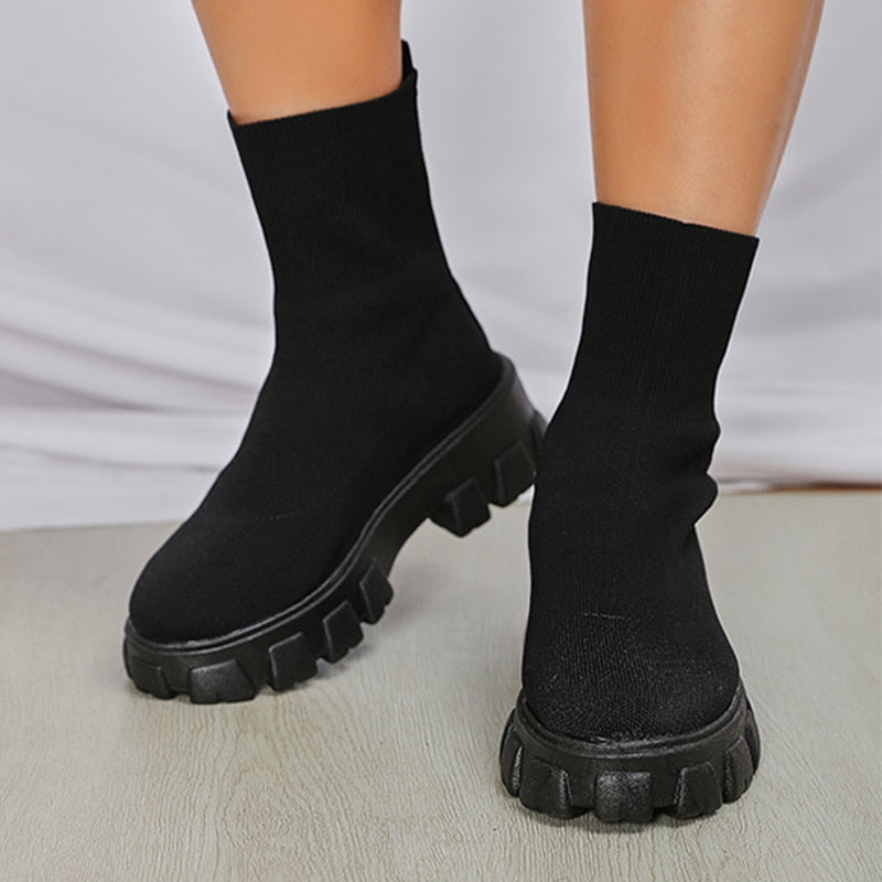 Durable women's slip-on ankle boots, providing stylish support for all-day comfort.