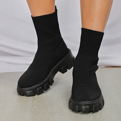 Durable women's slip-on ankle boots, providing stylish support for all-day comfort.
