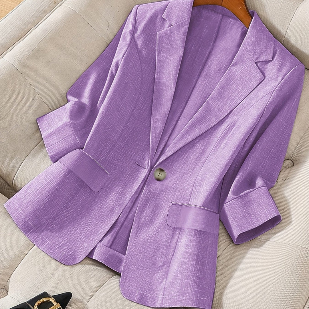 White tailored business casual blazer. Women's cropped jacket with 3/4 sleeves, versatile for modern fashion.