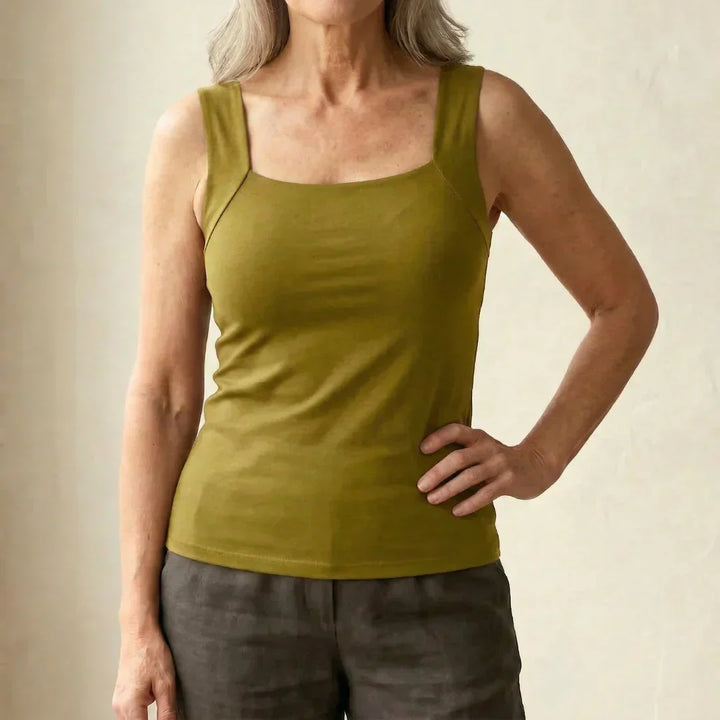 Sleeveless women's built-in bra tank, perfect for warm weather or under cardigans.