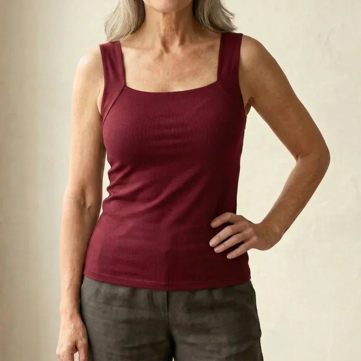 Soft fabric women's comfort tank with built-in wire-free bra, ideal for all-day wear.