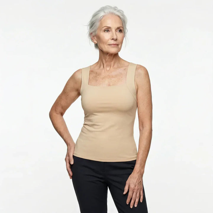 Pink women's sleeveless top with built-in bra support, designed for all-day casual wear.