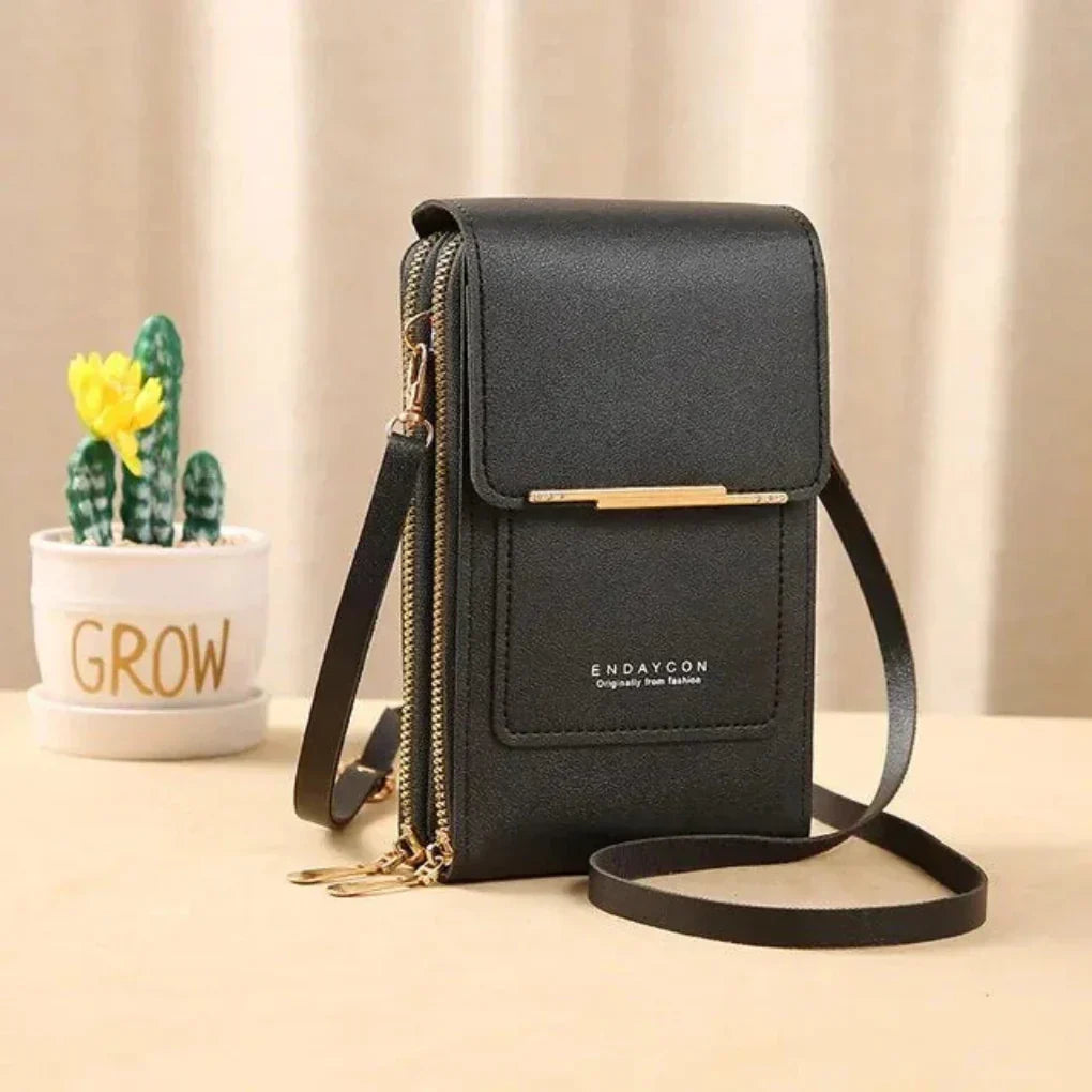 Women's black touchscreen phone crossbody bag for hands-free convenience & easy smartphone access.