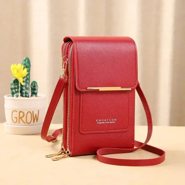 Elegant women's crossbody bag with clear touchscreen pocket, a chic hands-free travel essential.