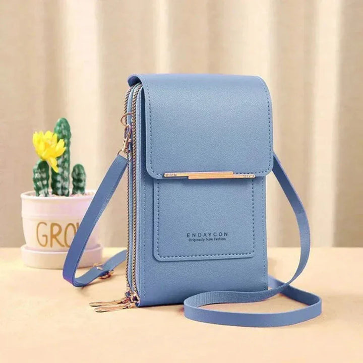 Chic women's accessory: A functional crossbody phone bag with a touchscreen pocket for ultimate convenience.