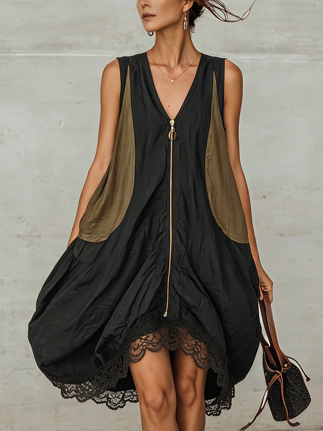 Women's black V-neck midi dress with stylish zip front and delicate lace hem, perfect for casual summer elegance.