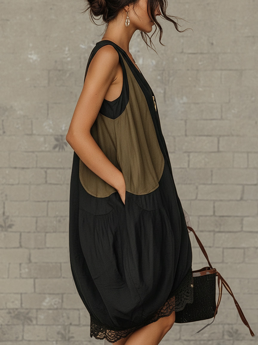 Relaxed fit women's black sleeveless midi dress featuring a flattering V-neck, front zip, and intricate lace detail.
