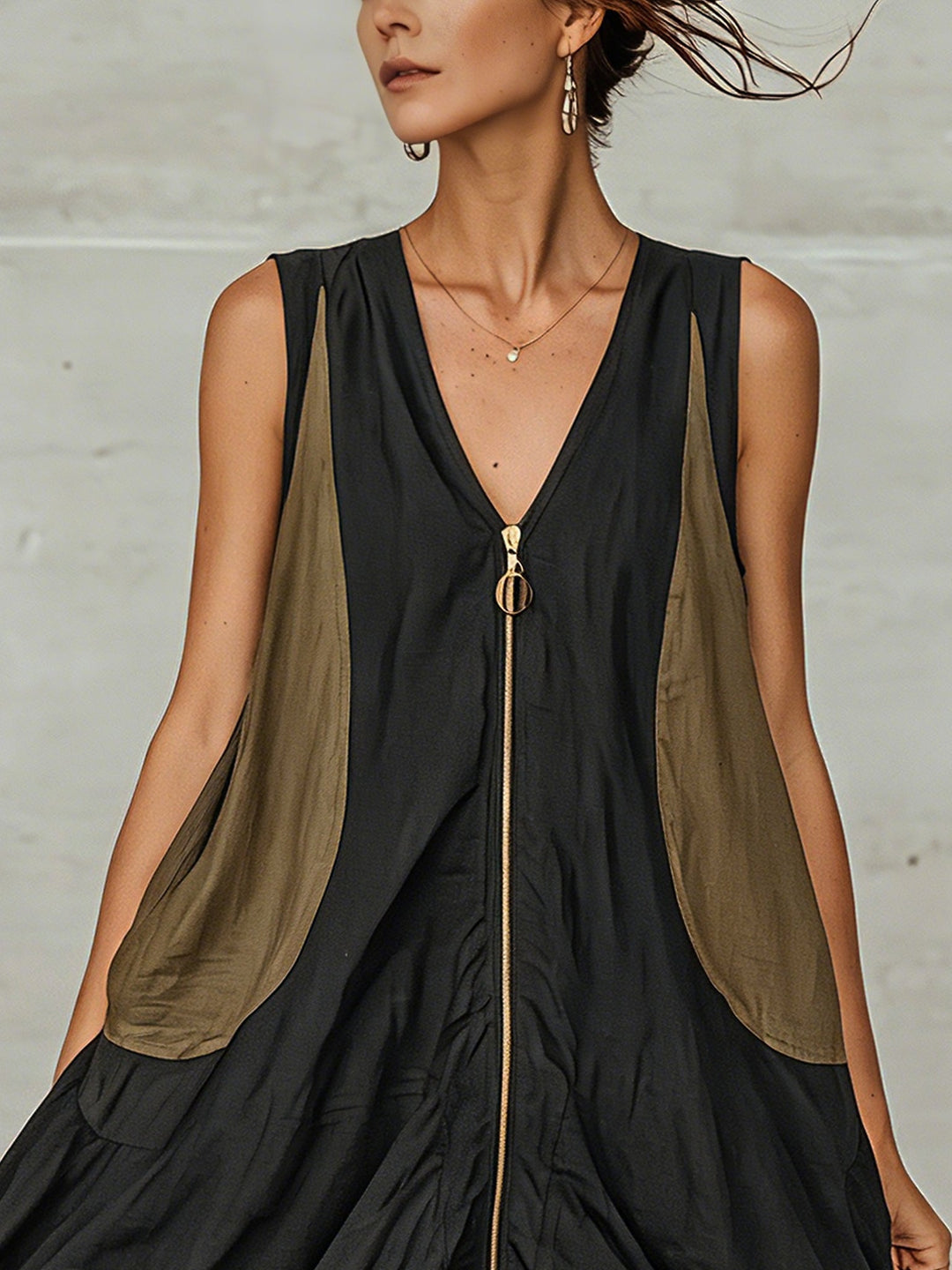 Elegant black V-neck midi dress for women with a functional zip front and an eye-catching, pretty lace hem.