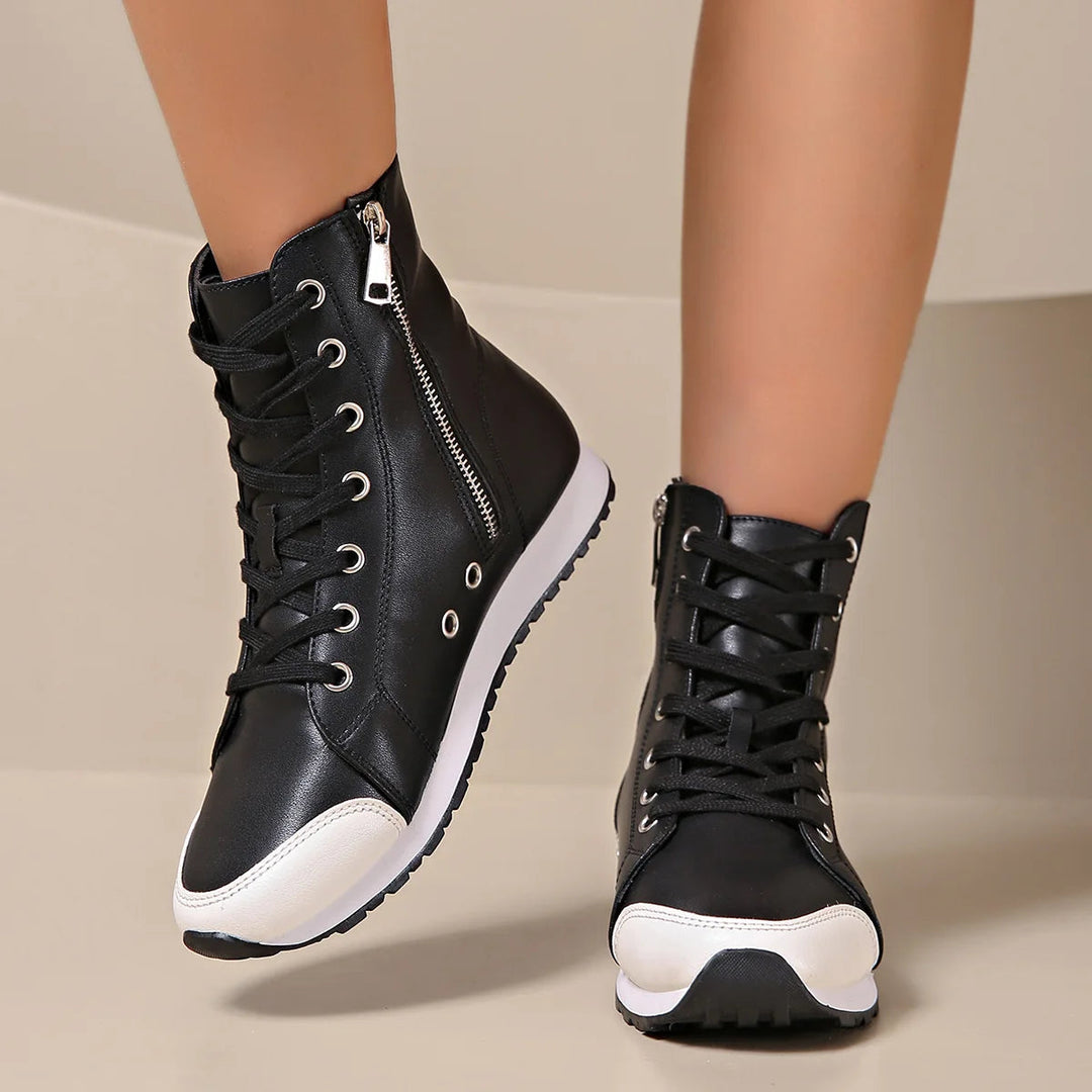 Black women's wide fit orthopedic athletic shoes, perfect for walking and offering essential foot support.