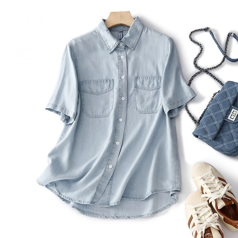 Relaxed fit women's blue button-up shirt, long sleeve, comfortable & stylish for spring or fall everyday wear.