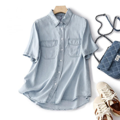 Relaxed fit women's blue button-up shirt, long sleeve, comfortable & stylish for spring or fall everyday wear.