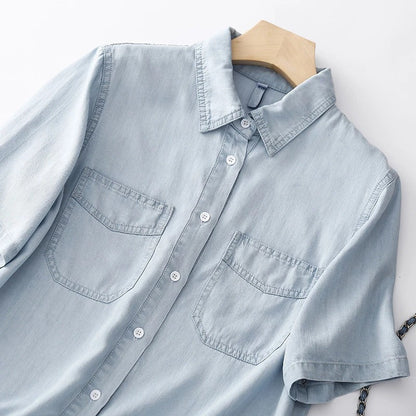 Effortless blue women's long-sleeve button-up shirt. Casual, stylish, & versatile for everyday spring/fall fashion.